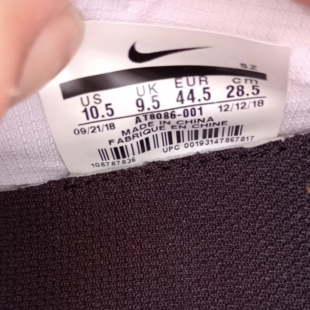 Nike White Athletic Slip-Ons with Strap‎